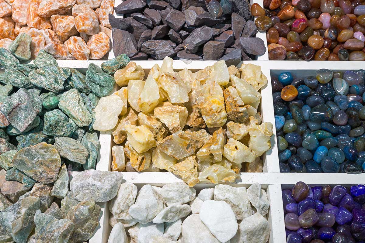 Colorful semi-precious stones in display trays